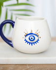 Taza con el ojo que todo lo ve